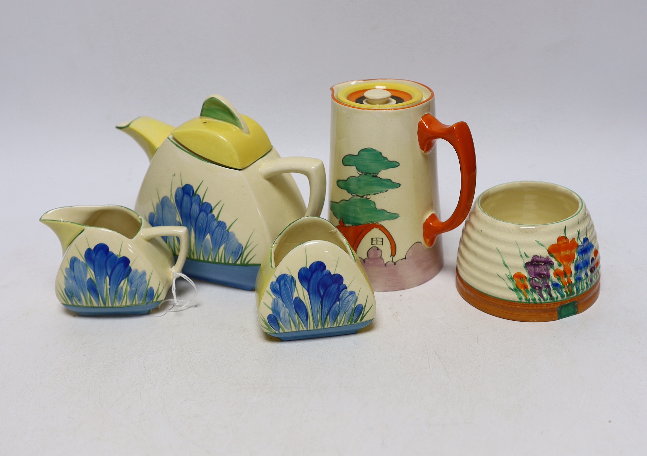 A Clarice Cliff Blue crocus three piece teaset, and two other pieces